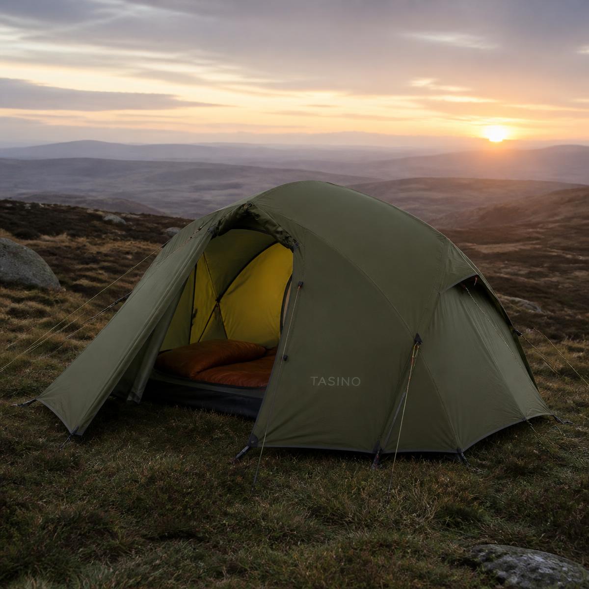 Olive TASINO two-person expedition tent pitched on moorland at dawn